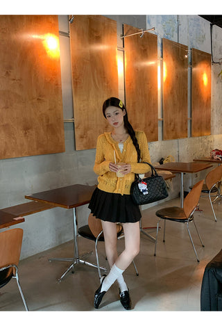 yellow knit cardigan