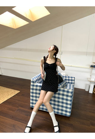 black polka-dot dress