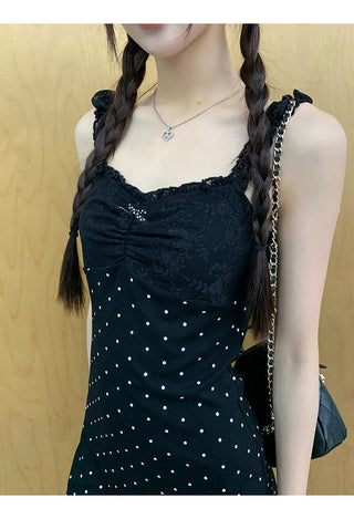 black polka-dot dress