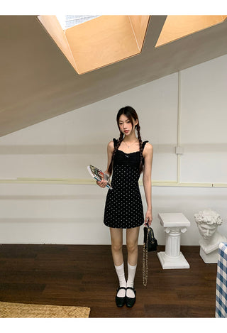 black polka-dot dress