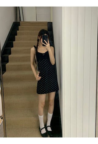 black polka-dot dress