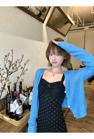 black polka-dot dress