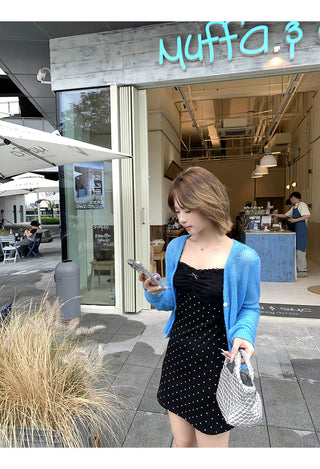 black polka-dot dress