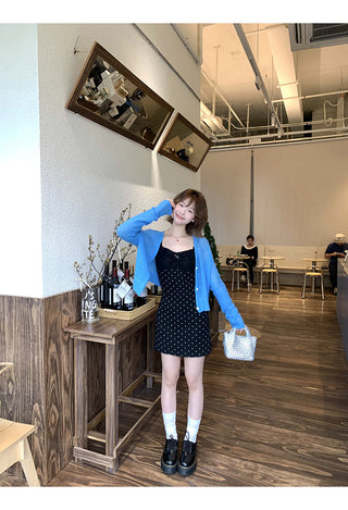 black polka-dot dress