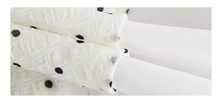 white polka camisole
