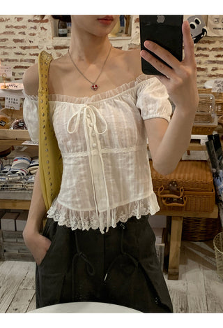 white off-shoulder shirt