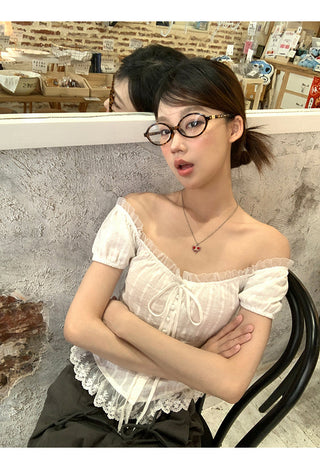 white off-shoulder shirt