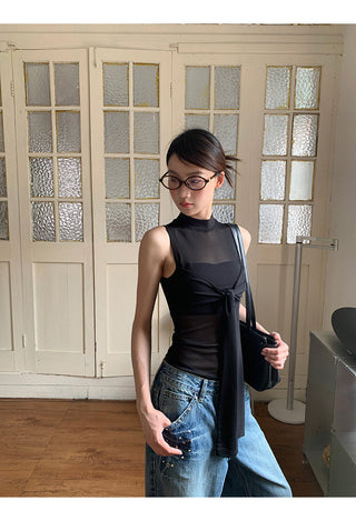 black sleeveless vest