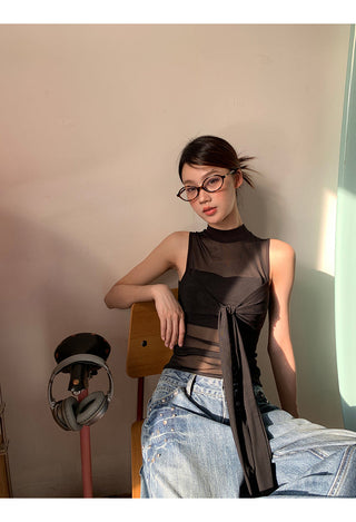 black sleeveless vest