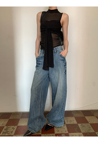 black sleeveless vest