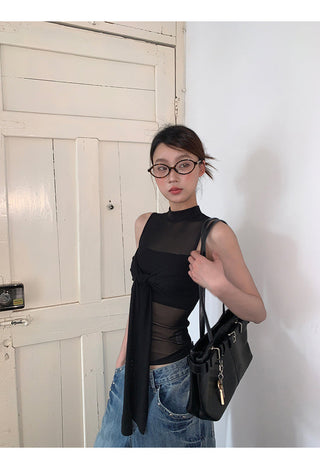 black sleeveless vest