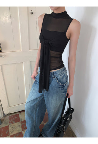 black sleeveless vest