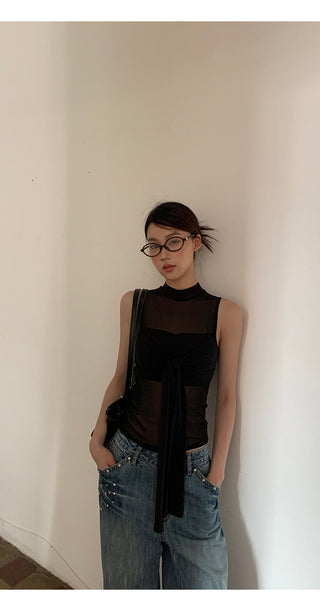 black sleeveless vest