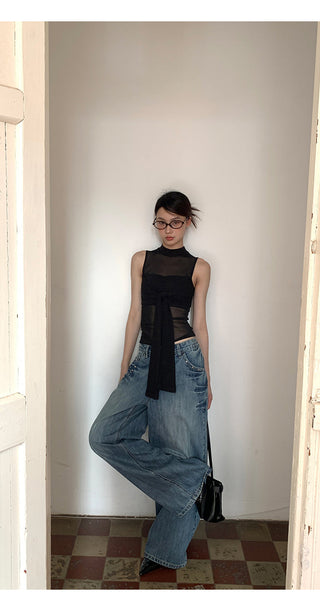 black sleeveless vest