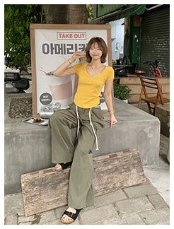 green wide overalls