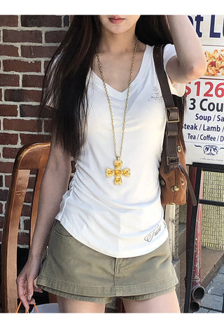 white V-neck top