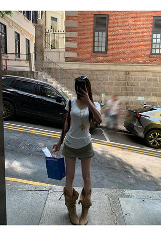 white V-neck top
