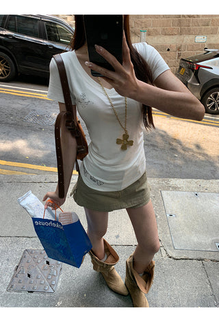 white V-neck top