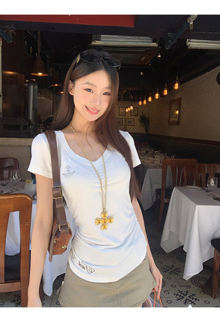 white V-neck top