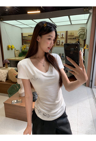 white V-neck top