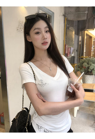 white V-neck top