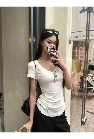 white V-neck top