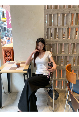white V-neck top