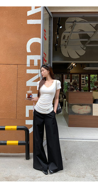 white V-neck top