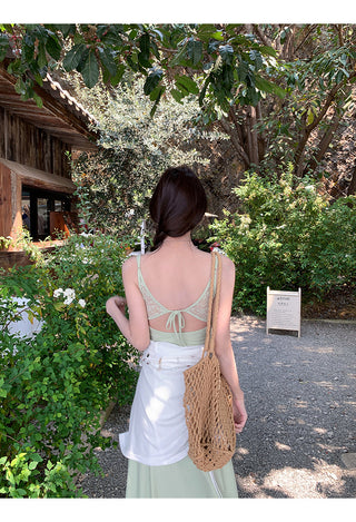 green figure-flattering dress