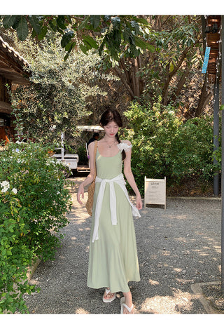 green figure-flattering dress
