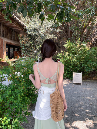 green figure-flattering dress