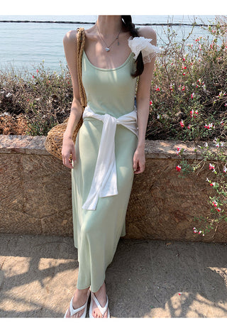 green figure-flattering dress