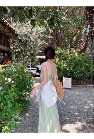 green figure-flattering dress