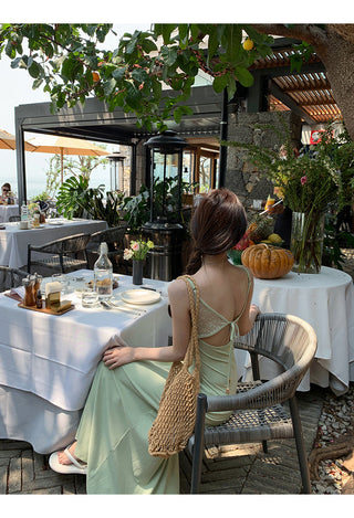 green figure-flattering dress