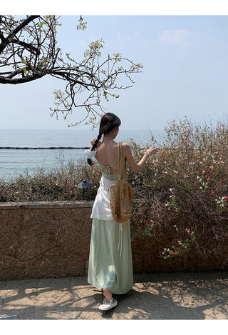 green figure-flattering dress