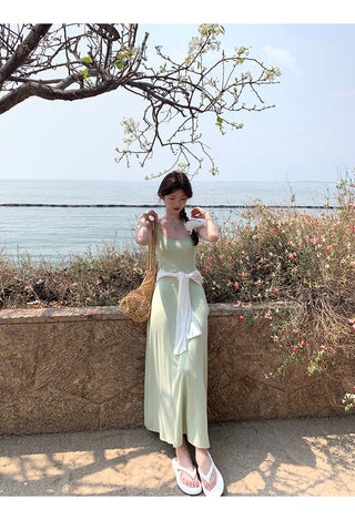 green figure-flattering dress