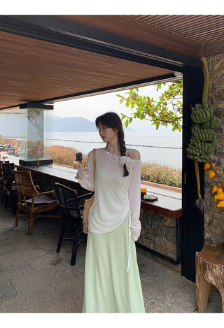 green figure-flattering dress