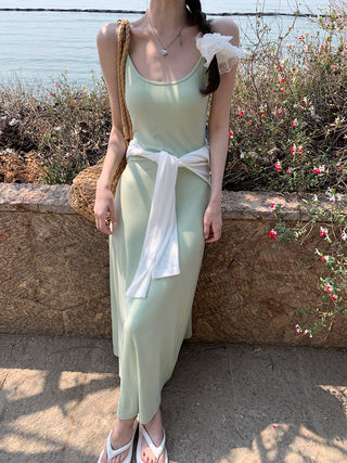 green figure-flattering dress