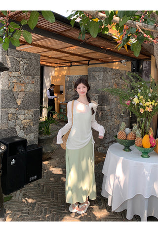 green figure-flattering dress