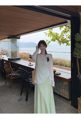 green figure-flattering dress