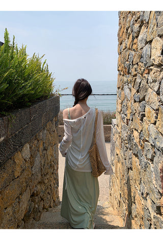 green figure-flattering dress