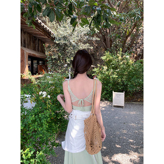 green figure-flattering dress