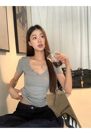 gray V-neck top