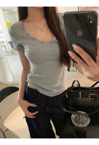 gray V-neck top
