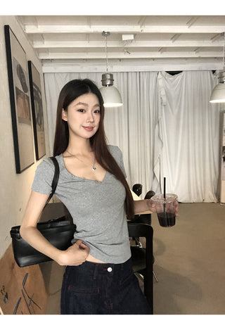 gray V-neck top