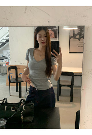 gray V-neck top