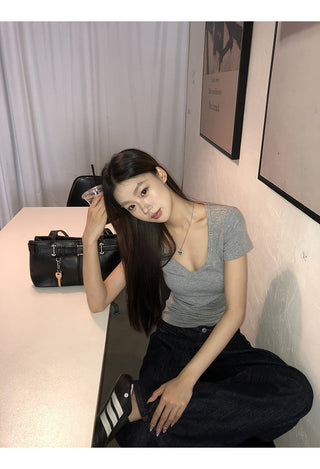 gray V-neck top