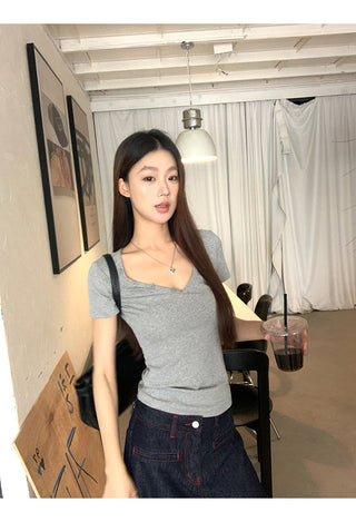 gray V-neck top