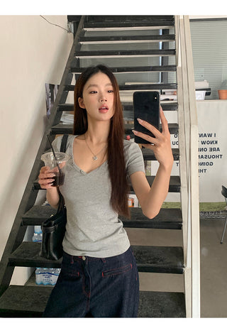 gray V-neck top