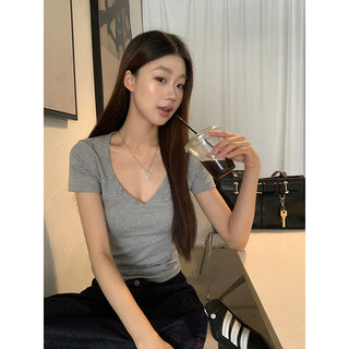 gray V-neck top
